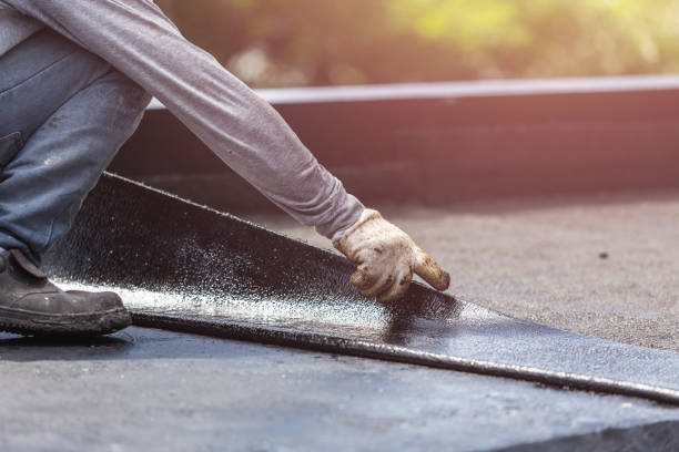 Professional Basement Waterproofing technician working in Bunker Hill, IN